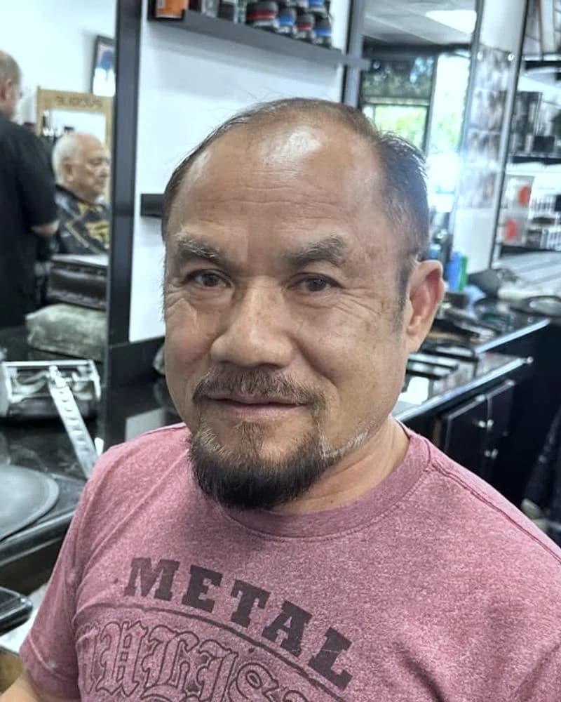Long, barber at Bellagios Barbers